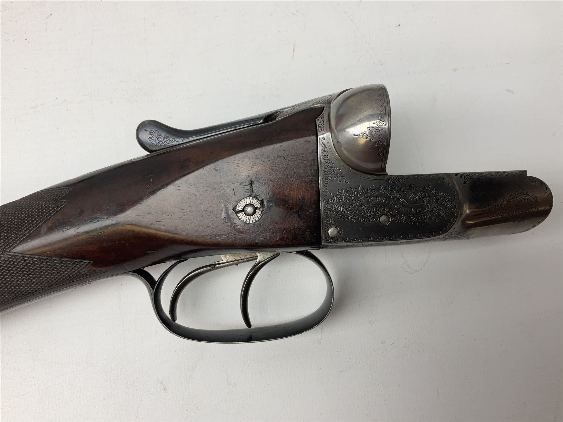 W.W. Greener 12-bore side-by-side double barrel non-ejector shotgun, with 76cm barrels, side safety, engraved lock, figured walnut stock with chequered grip and fore-end, no.33408, 120.5cm overall; in fitted canvas covered case with tools and accessories including .22 12-bore dog training device. SHOTGUN CERTIFICATE REQUIRED.