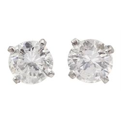 Pair of 18ct white gold round brilliant cut diamond stud earrings, total diamond weight approx 1.20 carat