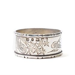 Silver napkin ring with engraved decoration and silver mounted oak pepper mill