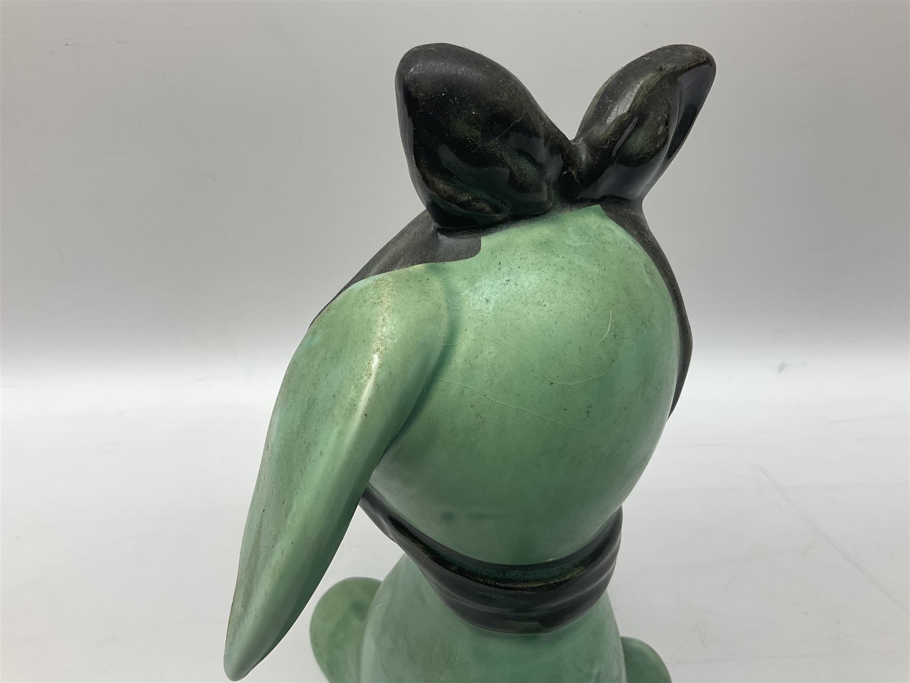 Sylvac 'toothache' dog in the green colourway, no 2451, with impressed beneath, H28.5cm
