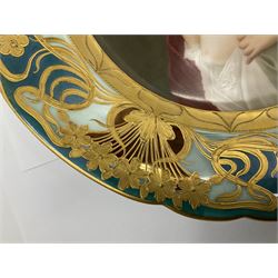 Late 19th century Vienna cabinet plate, finely painted with a semi nude portrait of a classical female beauty, within stylised gilt Art Nouveau floral and foliate shaped border upon alternating teal and pale blue ground, with underglazed blue beehive and impressed marks and entitled Ustana Dec:294 3676 / 294 27a, D24cm