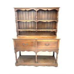 Georgian style oak pot board dresser, fitted with two tier plate rack and two short drawers, turned supports joined by solid undertier 