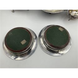 Silver plated seven bar toast rack by Mappin & Webb, together with other silver plated items including pair of bottle coasters, swing handled baskets and two sauce boats