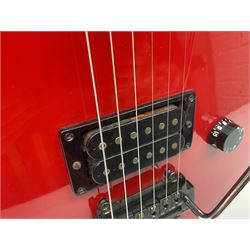 American Peavey Nitro 1 hand-made electric guitar in red with Kahler tremolo, serial no.02786479, L98cm overall; in soft carrying case.