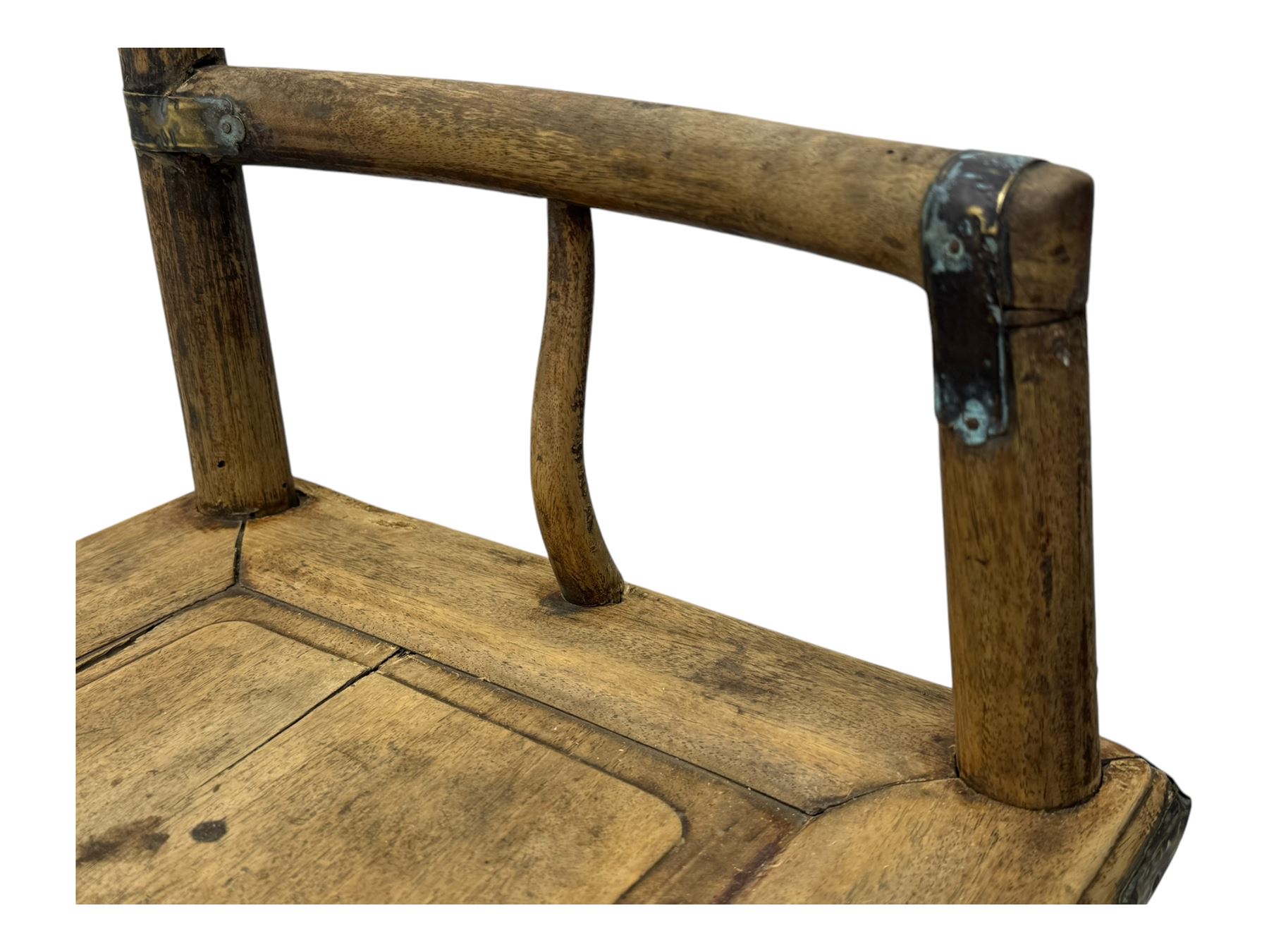 Late 19th century Chinese Qing dynasty high chair, rectangular back with central splat carved with stylised bat motif, applied brasswork to the arms and seat, on rounded supports with double stretcher