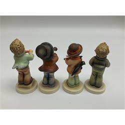 Thirty Hummel figures by Goebel, to include Saluting the Peacekeepers of Operation Joint Endeavor, on wooden plinth, Call to Glory, Celebrate with Song and Soldier Boy
