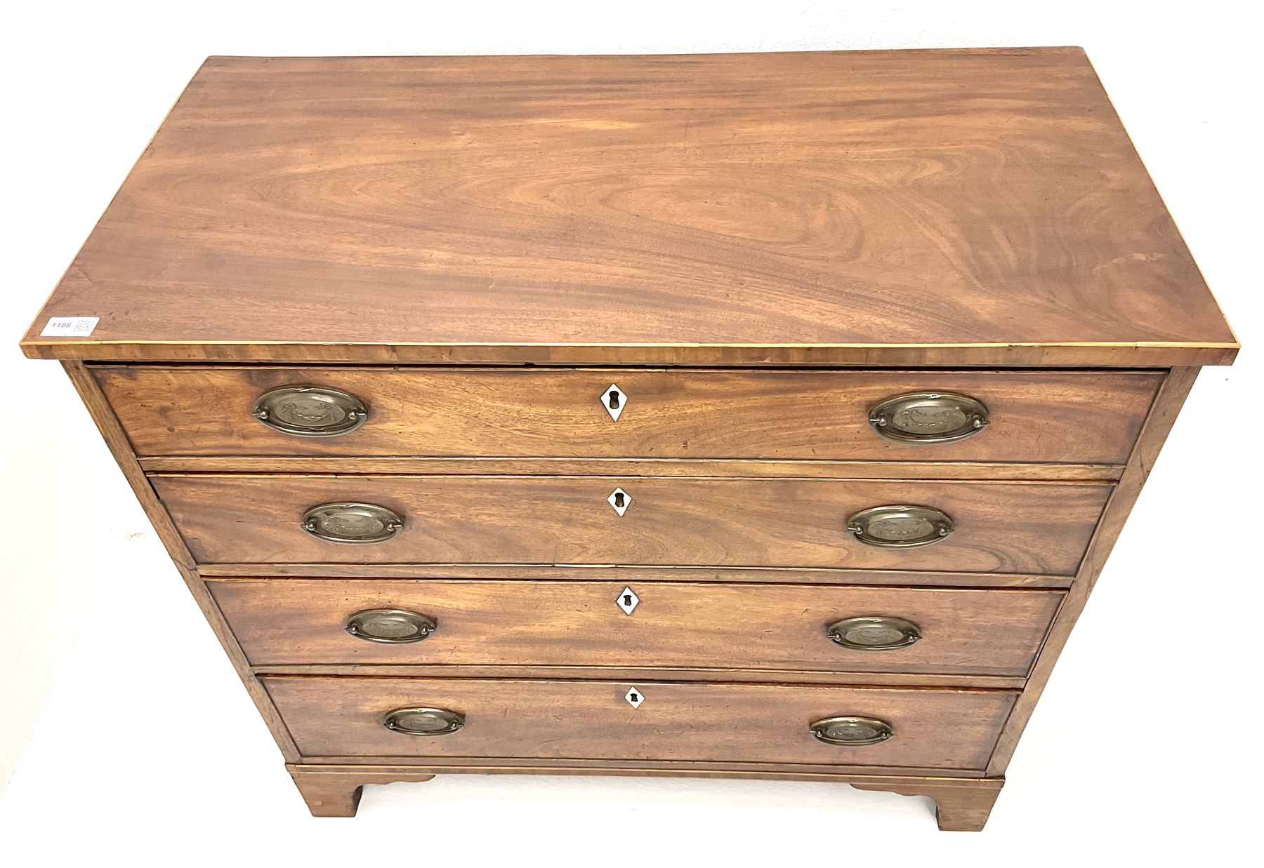 19th century mahogany chest, four graduating cockbeaded drawers, ogee bracket supports 