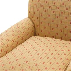 Pair of Victorian style armchairs of traditional shape, high rolled and sprung back over rolled arms, upholstered in chequered fabric with pineapple motifs with loose seat cushion, on turned feet with brass castors