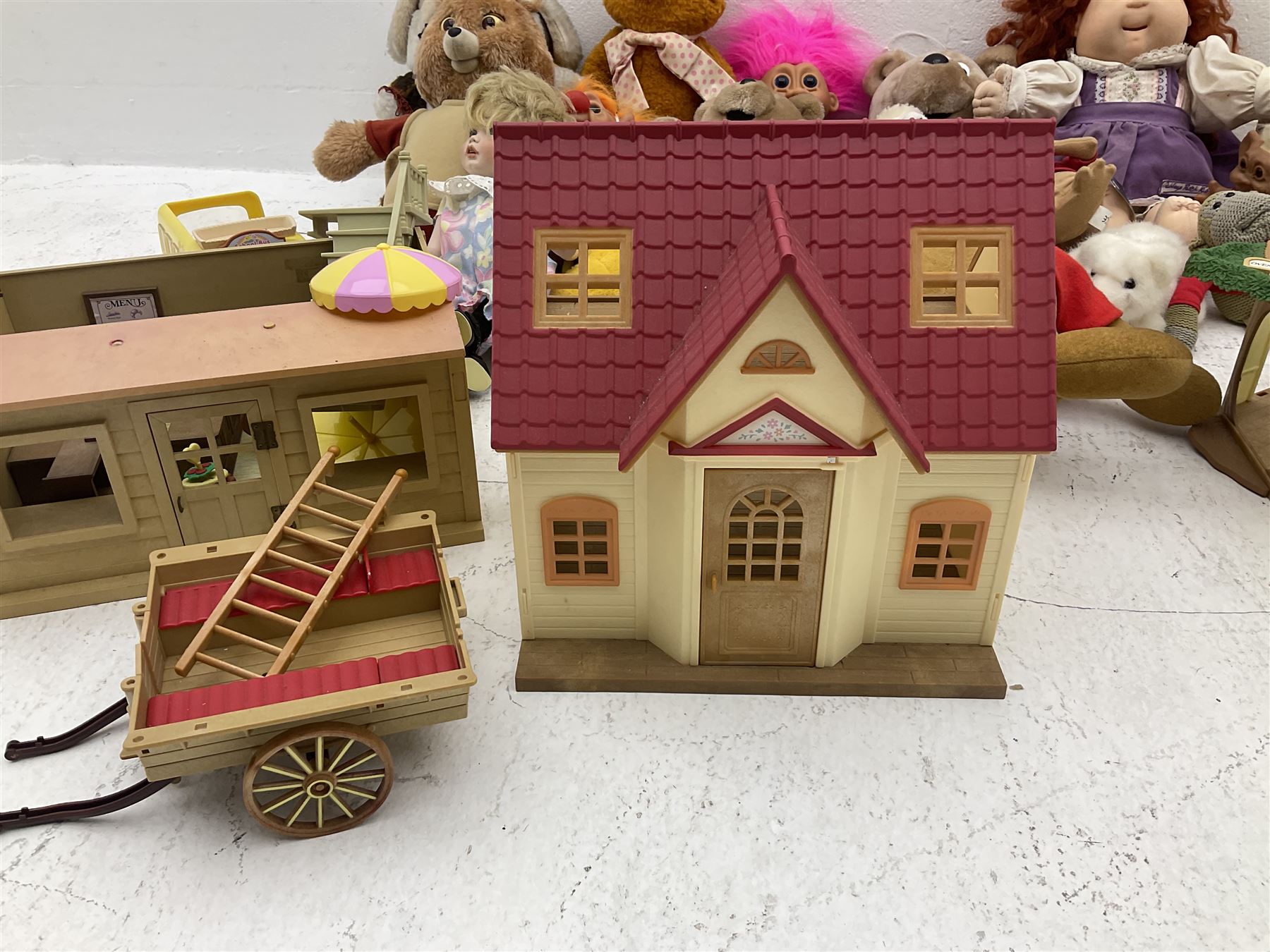 Quantity of stuffed toys and dolls to include Teddy Ruxpin, Cabbage Patch, Troll doll, and a quantity of plastic toys including Sylvanian Families Country School etc, in two boxes