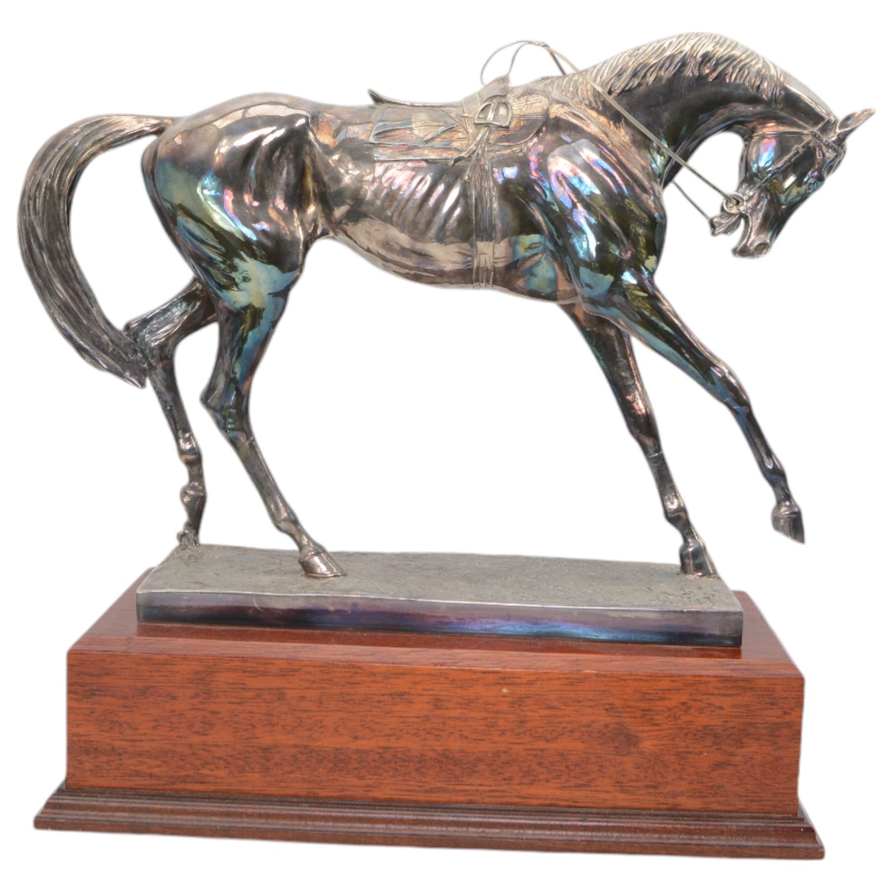 'The Freestone Stanley Lincoln Handicap Trophy, Doncaster Racecourse March 22nd 2003' - Silver filled model of a racehorse H32cm x W42cm on a mahogany plinth with silver plaque Sheffield 2003 Maker Laurence R Watson & Co.; together with a framed photograph of Guy Reed receiving the trophy (2)