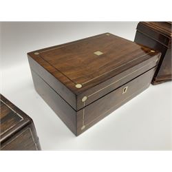 Georgian mahogany tea caddy, of rectangular form, the stepped hinged cover with swan neck handle, opening to reveal three lidded compartments, upon four bracket feet, together with a mahogany sarcophagus shaped tea caddy and three rosewood boxes with mother of pearl inlay, tallest H16cm