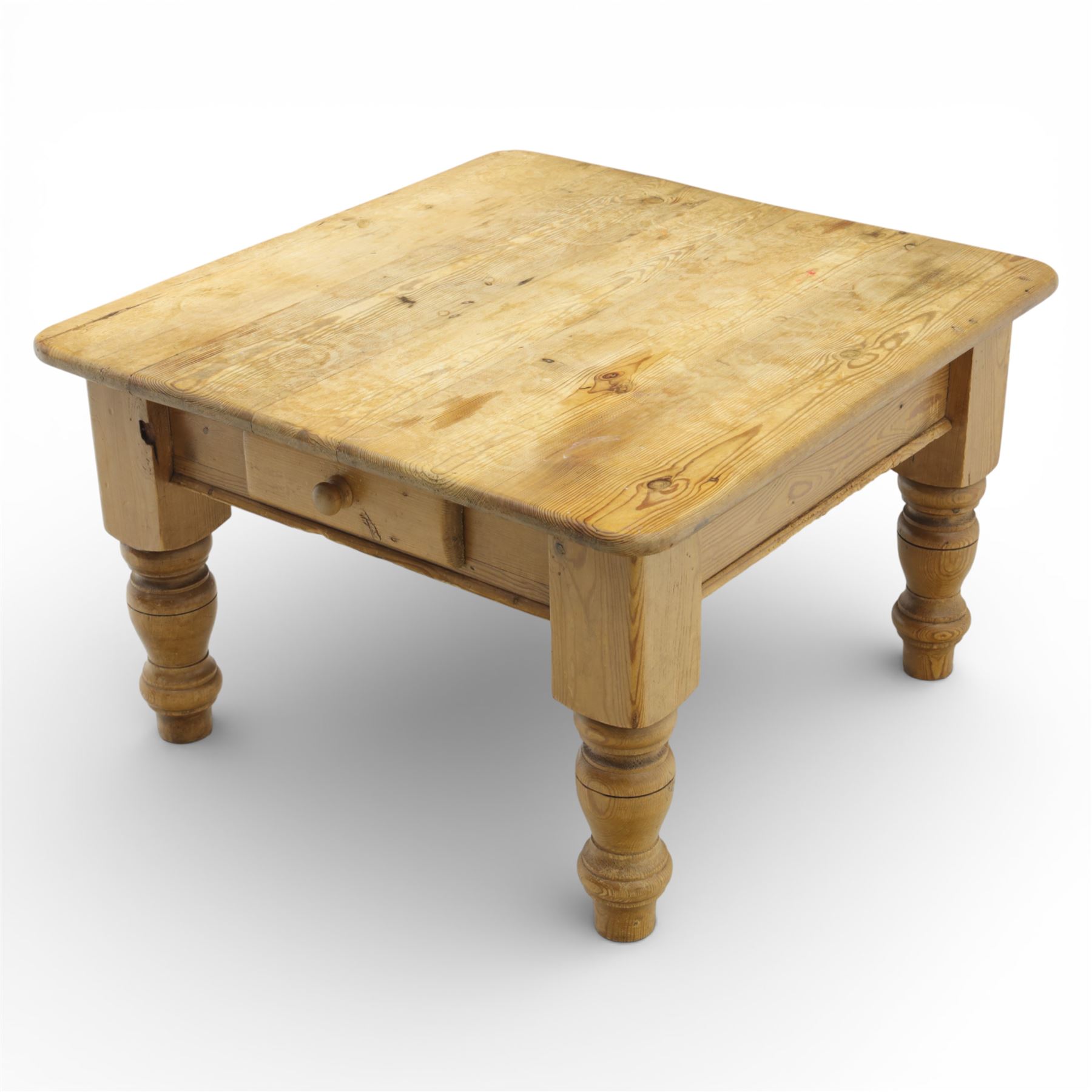 20th century stripped pine coffee table, square top over two frieze drawers, raised on block and turned supports
