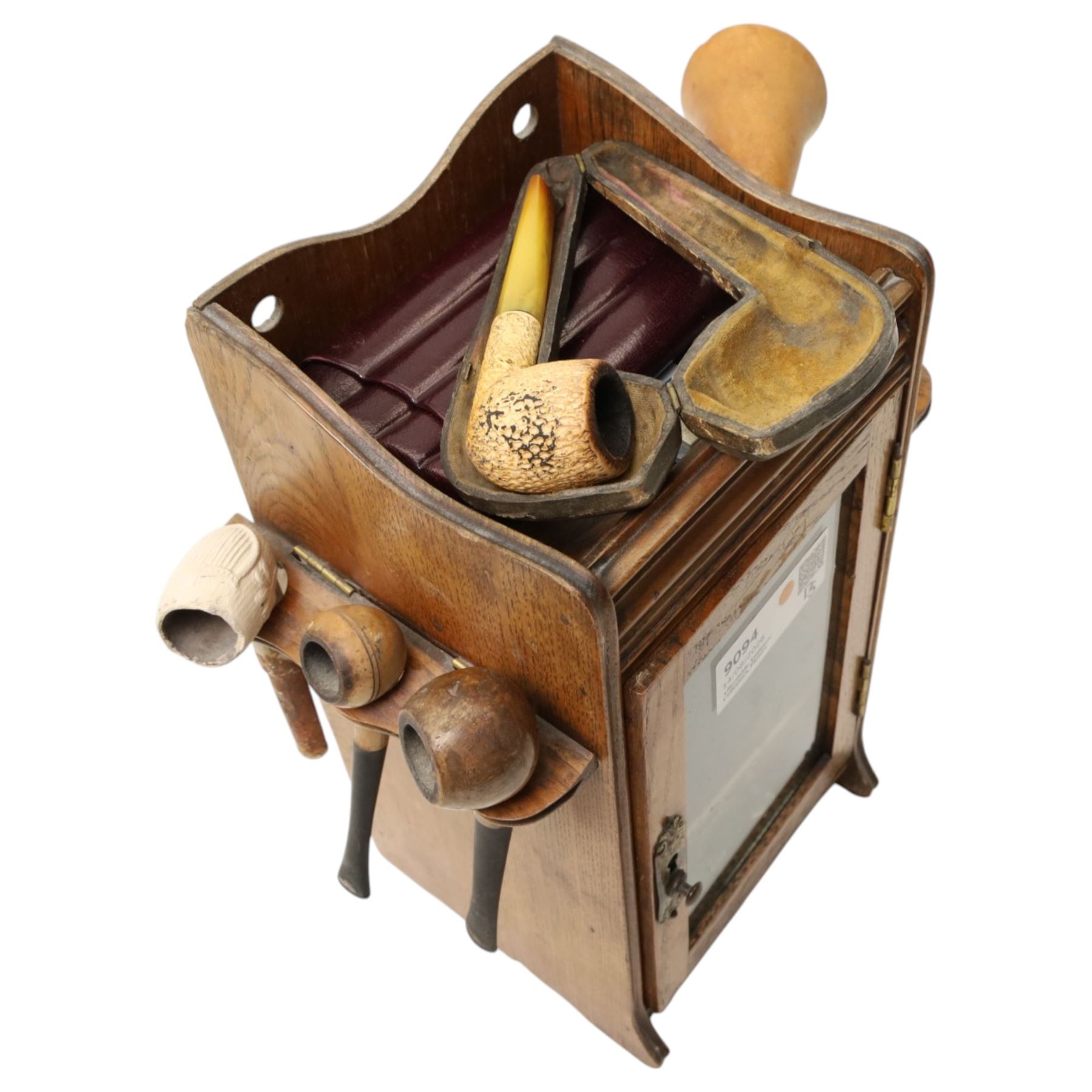 Small Edwardian oak smoker's cabinet with tobacco jar, Meerschaum pipe, three clay pipes, cigar cutter etc