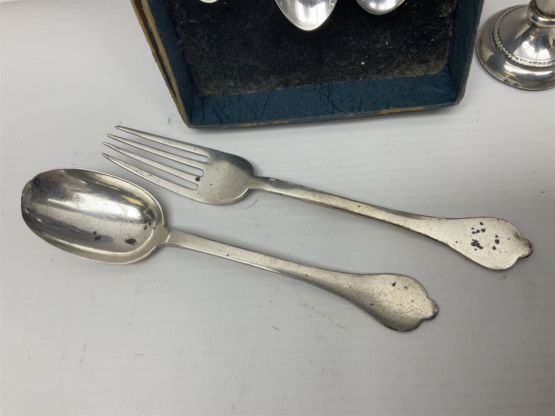 Silver plated tray, with shaped rim and embossed with a dog and crown to centre, stamped Valenti, together with three silver plated decanter labels, two port and one Bucellas, a plated cream jug with embossed floral decoration and a pair of plated fish knives engraved with double headed eagle to handle, tray W25.5