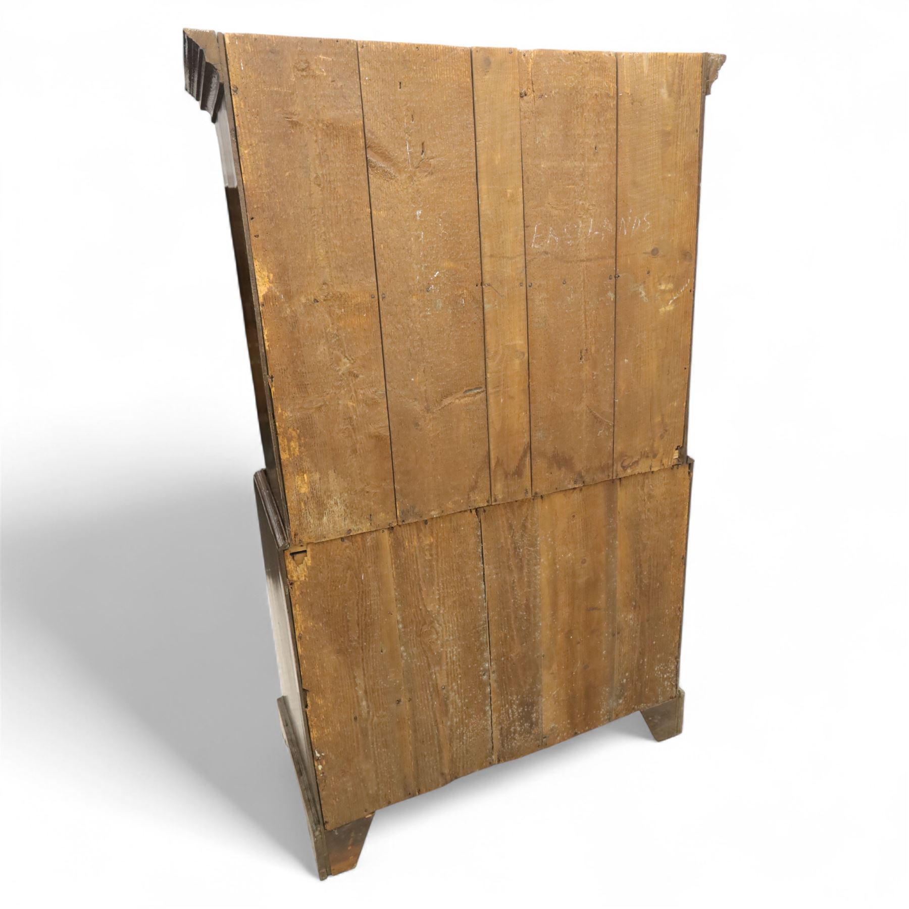 Mid 18th century oak tallboy chest, the projecting cavetto-moulded cornice over two short and three long drawers to the upper section, the lower section with three further graduated long drawers, each drawer with oak linings and fitted with later brass swan-neck handles, flanked by stop-fluted quarter columns, all raised on shaped bracket feet