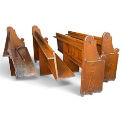 Set of four early 20th century single-ended stained pine ecclesiastical church pews, the shaped end support flanking slatted and panelled back