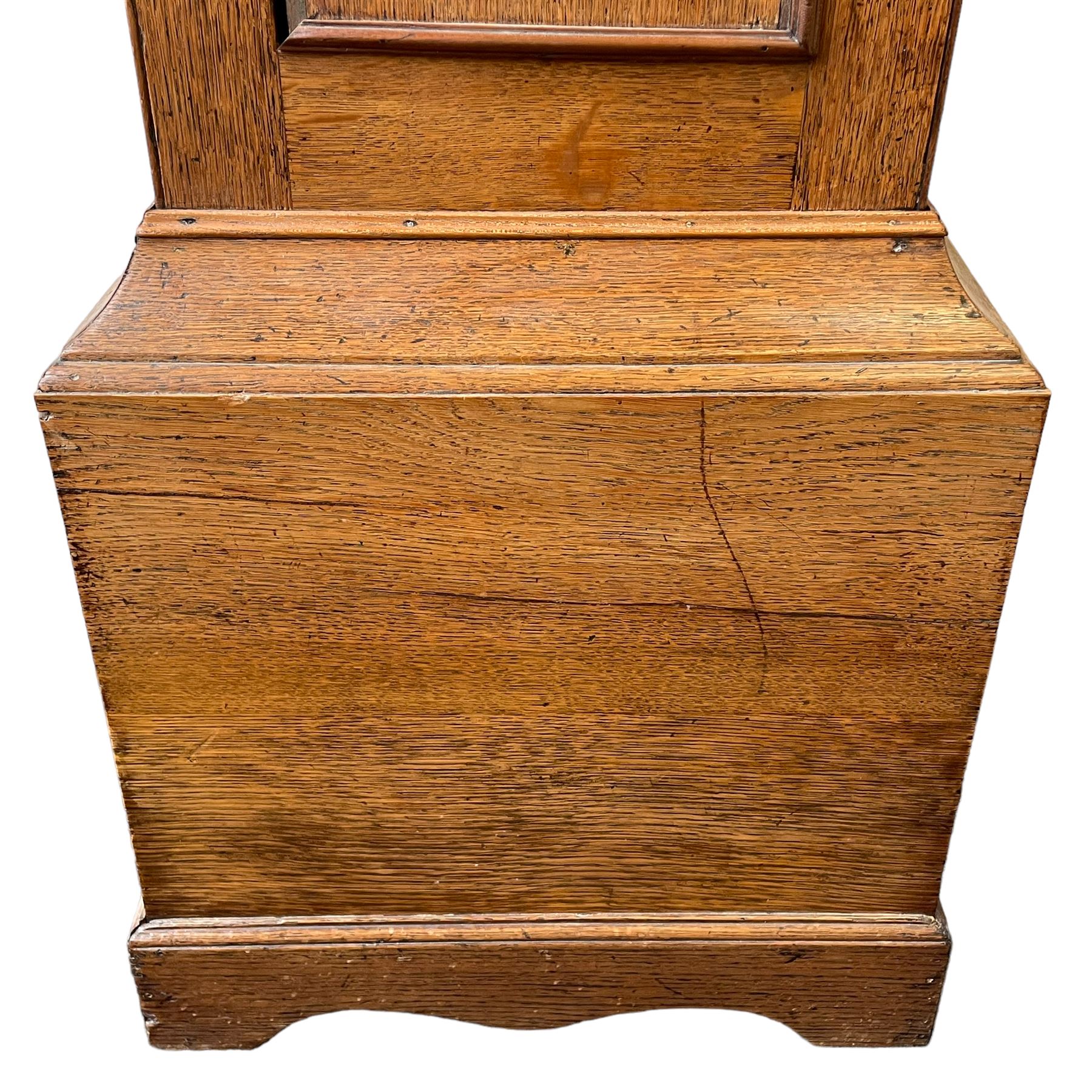 William Gostling of Diss  (Norfolk)-  Late 18th century 8-day oak longcase clock c1780-90, break arch top with scalloped cresting and three brass finials, glazed break arch hood door flanked by turned pilasters with brass capitals, trunk with a long trunk door and rounded top on a square plinth with an applied and shaped skirting, early painted Wilson of Birmingham dial with Roman numerals and five minute Arabic's, matching steel hands and second pointer, arched square ended calendar aperture with date disc behind, floral spandrels within gesso borders and a painted rocking automaton representing Mercury to the break arch, dial pinned via a false plate to a weight driven rack striking movement with a recoil anchor escapement, striking the hours on a cast bell. With pendulum weights and key. 
William Gostling (II) is recorded as working in Diss from 1774 to 1797, succeeded by widow Anne and son George . The dial of this clock is illustrated and discussed in detail in M.F. Tennants book 