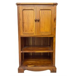 Unicornman - yew wood cabinet, moulded hinged lid over two panelled doors and shelves (W56cm, H99cm, D45cm); and four Unicorn man CD racks two in yew wood and two in oak (W20cm, H36cm, D20cm); all carved with unicorn signature and by Geoff Gell, Coxwold
