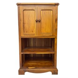Unicornman - yew wood cabinet, moulded hinged lid over two panelled doors and shelves (W56cm, H99cm, D45cm); and four Unicorn man CD racks two in yew wood and two in oak (W20cm, H36cm, D20cm); all carved with unicorn signature and by Geoff Gell, Coxwold
