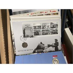 Approximately one hundred and fifteen Royal Mint coin covers, in two ring binder folders and loose, together with approximately 53 grams of Great British pre-1920 and approximately 68 grams of Great British pre-1947 silver threepence coins, and a small quantity of further pre-decimal coins