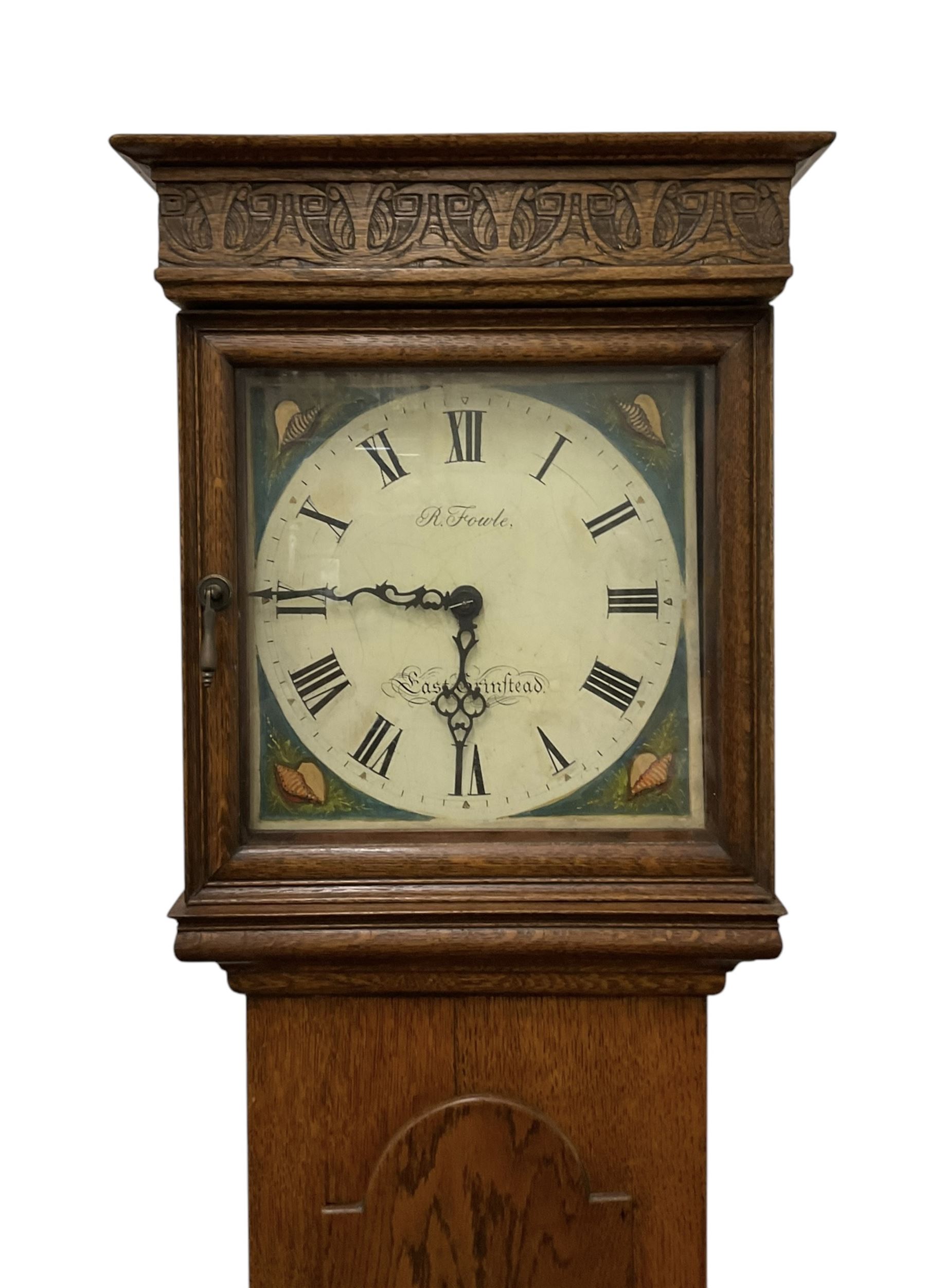Richard Fowle (III) of East Grinstead (Sussex)- 19th century 30hr oak cased longcase clock c 1830, with a flat topped pediment and carved frieze beneath, square hood door and a long rectangular trunk with a break arch toped door on a square plinth, painted dial with green spandrels, makers name and Roman numerals, dial pinned directly to a chain driven countwheel striking movement. With pendulum and weight. No  Bell.
The Fowle family were a prodigious family of Sussex clockmakers from 1715-1886, three family members were named Richard in succession. 
