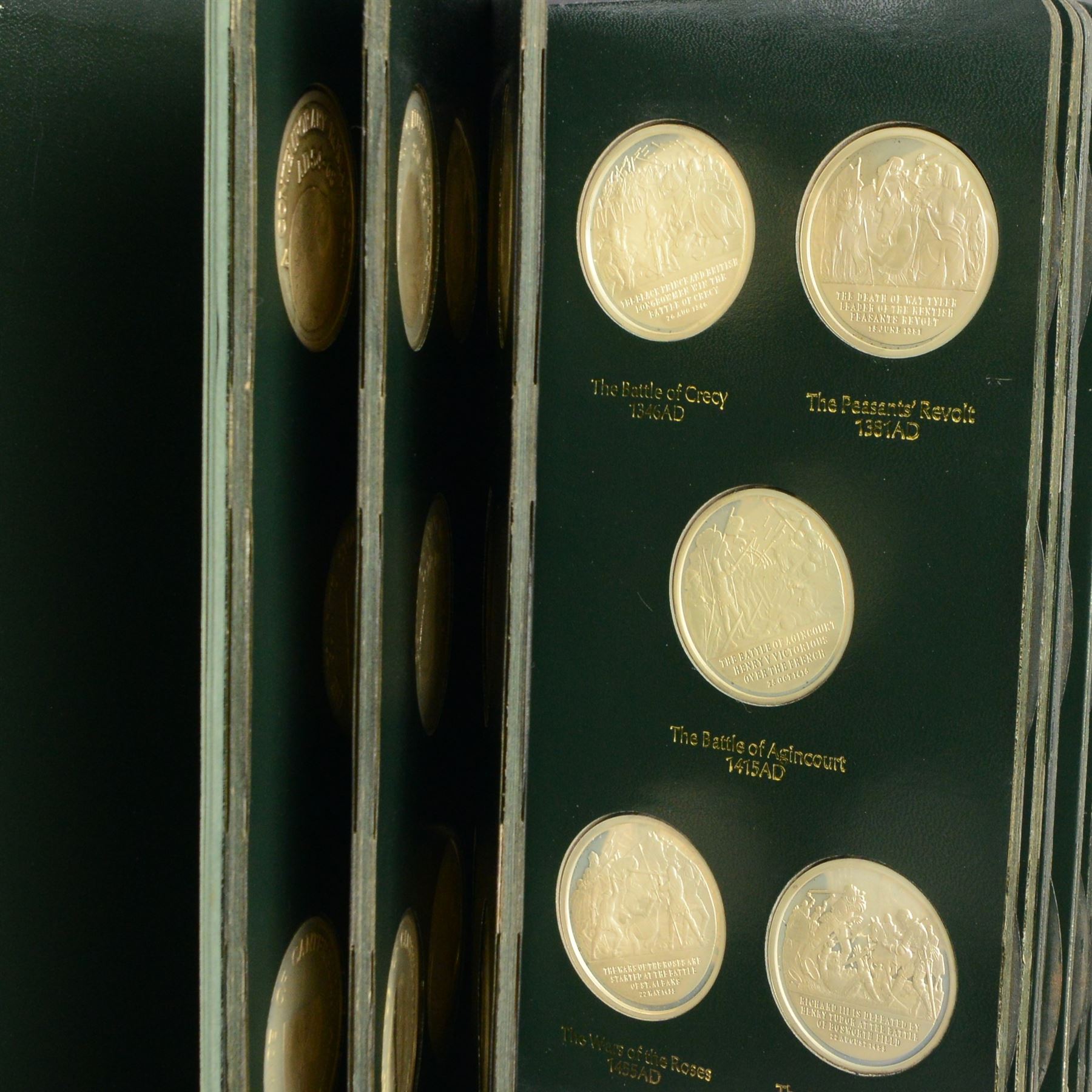 Limited Edition Danbury Mint 'History of the English Speaking Peoples' complete set of fifty silver medallions, each depicting historical figures and scenes from Julius Caesar Lands 55BC to Second World War 1939AD, contained within leatherette folder with personalised presentation to cover and interior, no. 2780/7500