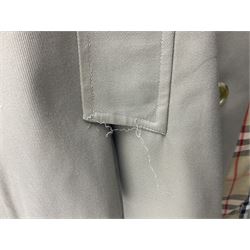 Ladies Burberry double breasted trench coat, with belt and detachable woollen gilet, in traditional cream colour with Burberry check lining, together with a gentlemans Burberry single breasted trench coat, both L112cm