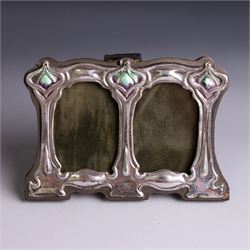 Silver mounted Art Nouveau style double photograph frame, with enamel decoration and woode...