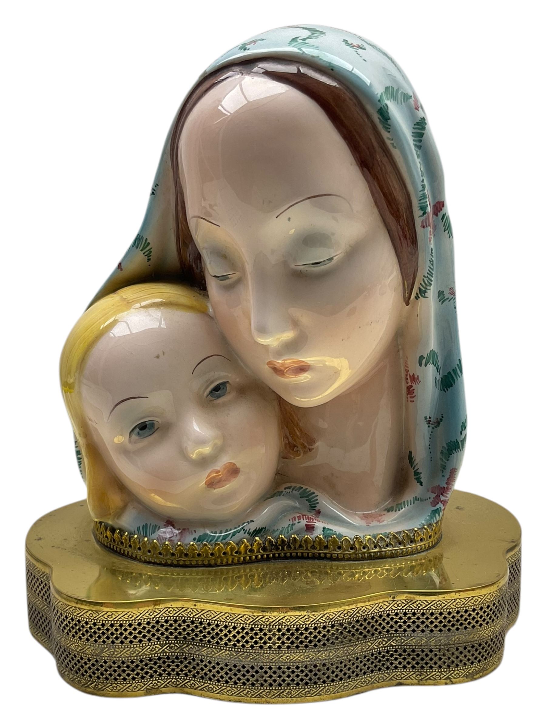 Madonna and Child painted porcelain bust, possibly Italian, on pierced brass base