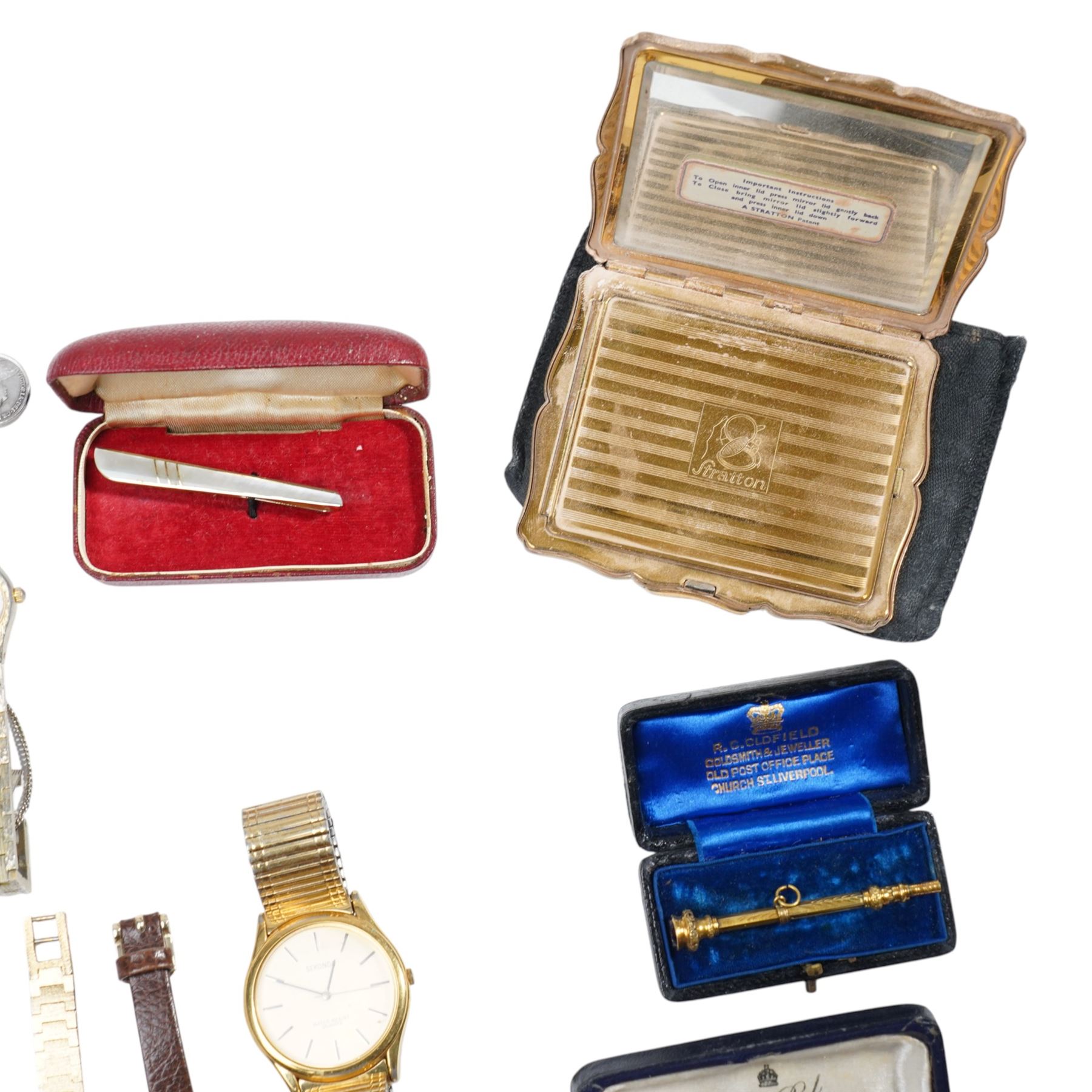9ct gold stone set brooches, 9ct gold wristwatch, three pence coin bracelet with a French gold filled Virgin Mary medallion, Stratton marcasite set compact, gilt propelling pencil, various wrist watches, Standard U.S.A pocket watch etc 