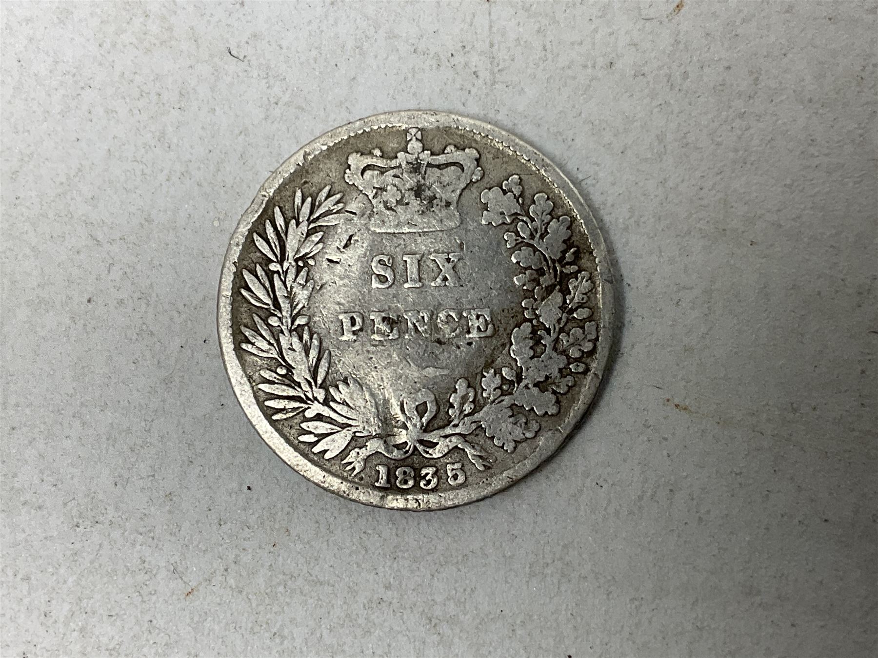 Approximately 120 grams of Great British pre 1920 silver coins, including George III 1819 half crown, William IIII 1834 shilling, Queen Victoria 1892 half crown, various silver threepence pieces etc