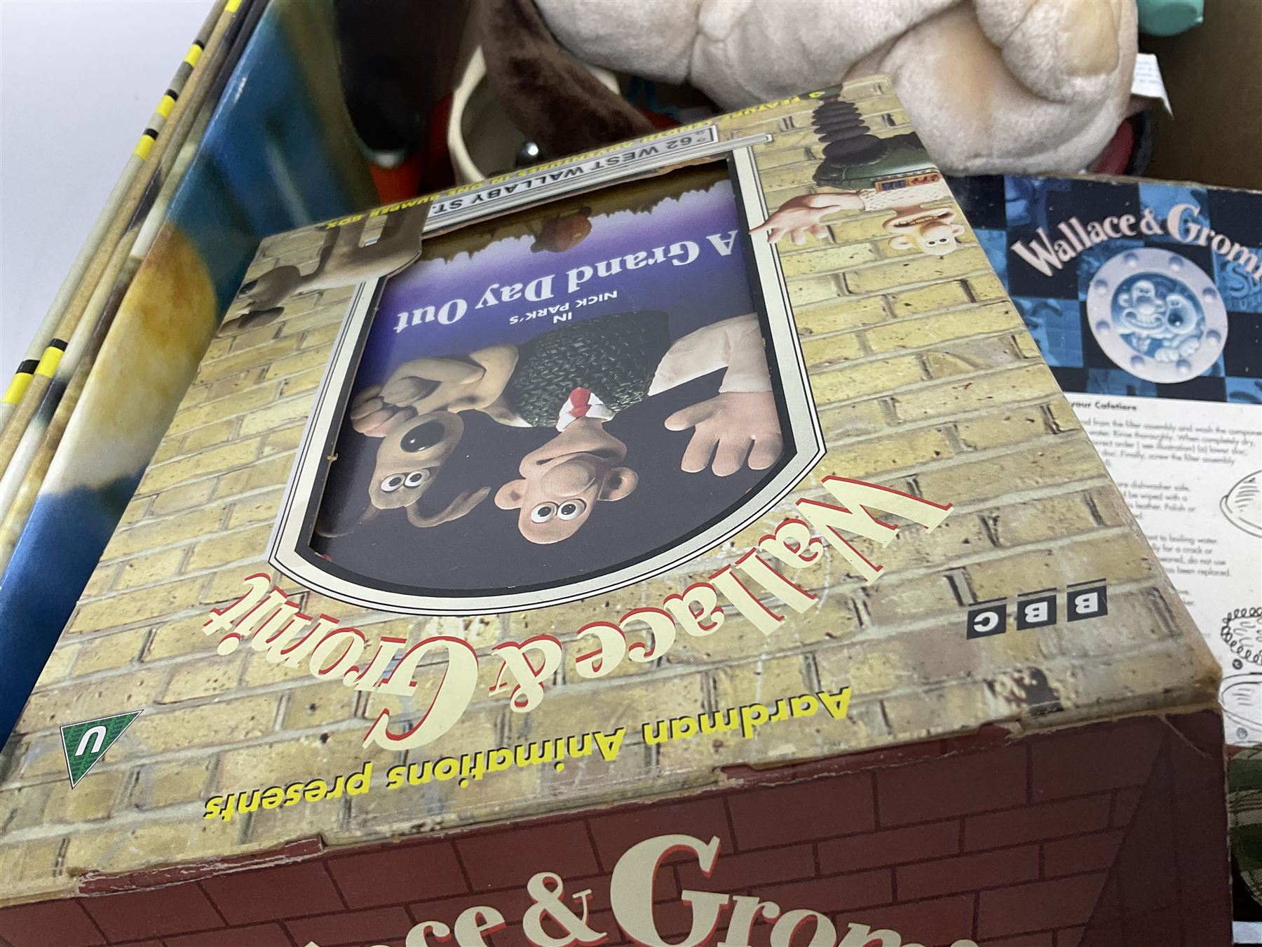 Wallace and Gromit and Shaun the Sheep collectables, including alarm clocks, plates, cafetiere, soft toys, etc, in two boxes