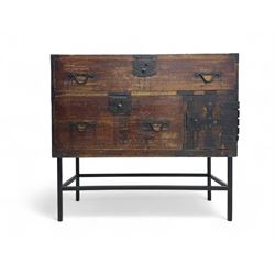 Late 19th century Japanese tansu chest, crafted with a cedar frame and cypress wood panels, original iron fittings throughout, comprising a single long drawer above smaller drawer and hinged cupboard door enclosing two smaller internal drawers and storage compartment, mounted on a bespoke black metal stand