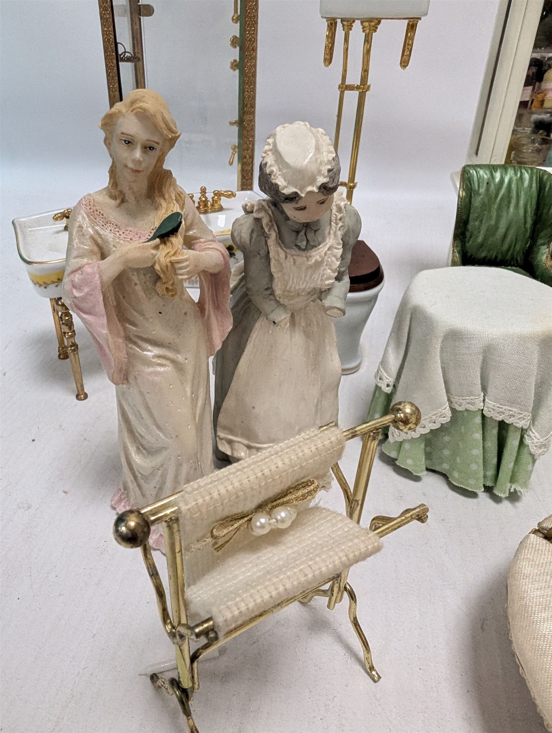 Dolls house bathroom and bedroom furniture, including bed, wardrobe, dresser filled with toiletries, shower, five figures, etc 