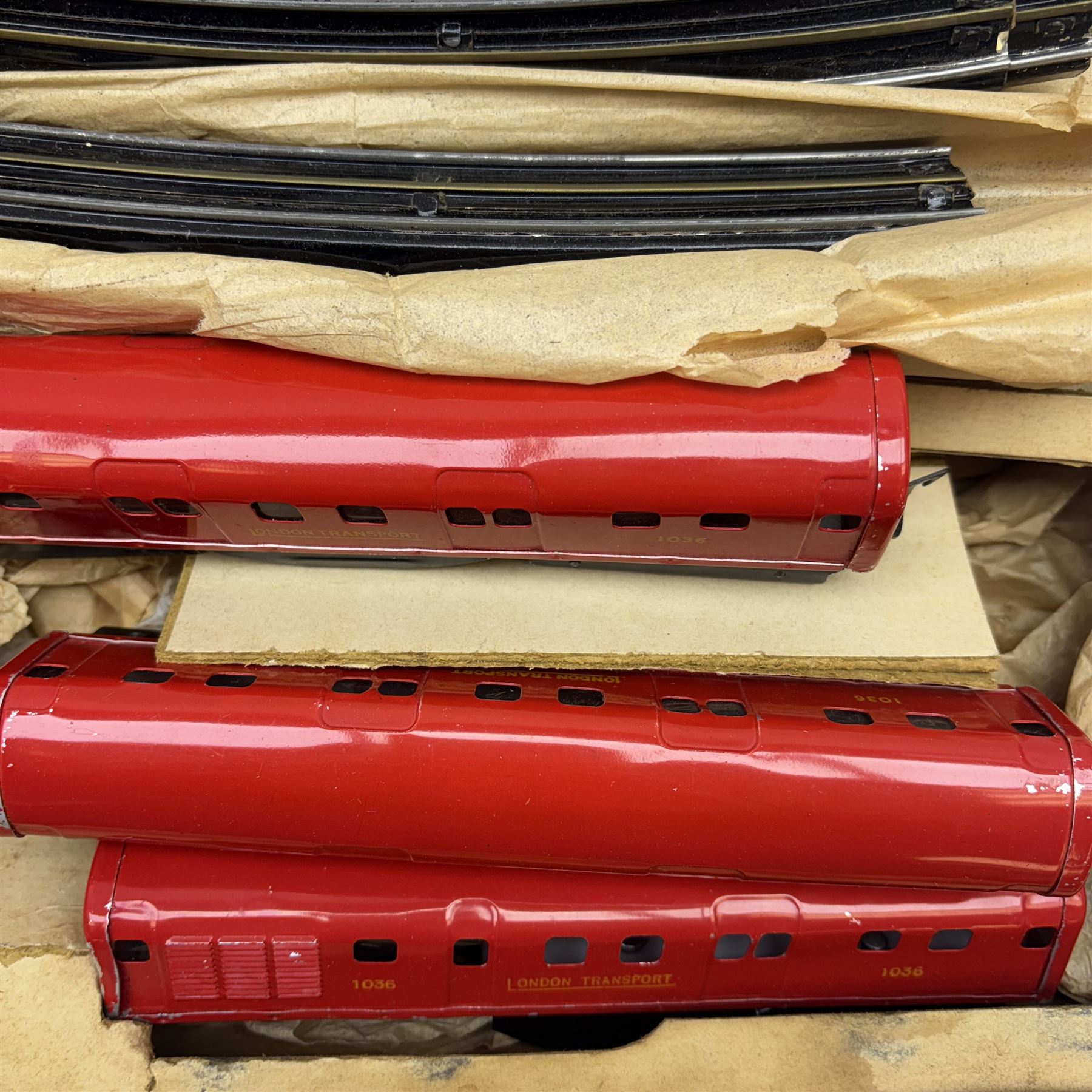 Ever Ready '00' gauge battery operated London Underground electric train set, including London Transport 3-rail power car, two passenger coaches, track and controller, in original box with operating instructions inside lid