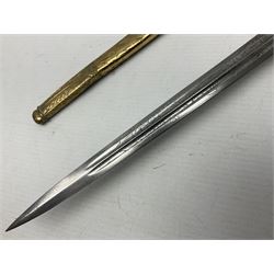WW2 German kreigsmarine style dagger composed from various age parts, the post-war 25cm double fullered blade  with etched decoration and inscribed WKC with knight's head; in gilt brass scabbard with two rings L42cm overall