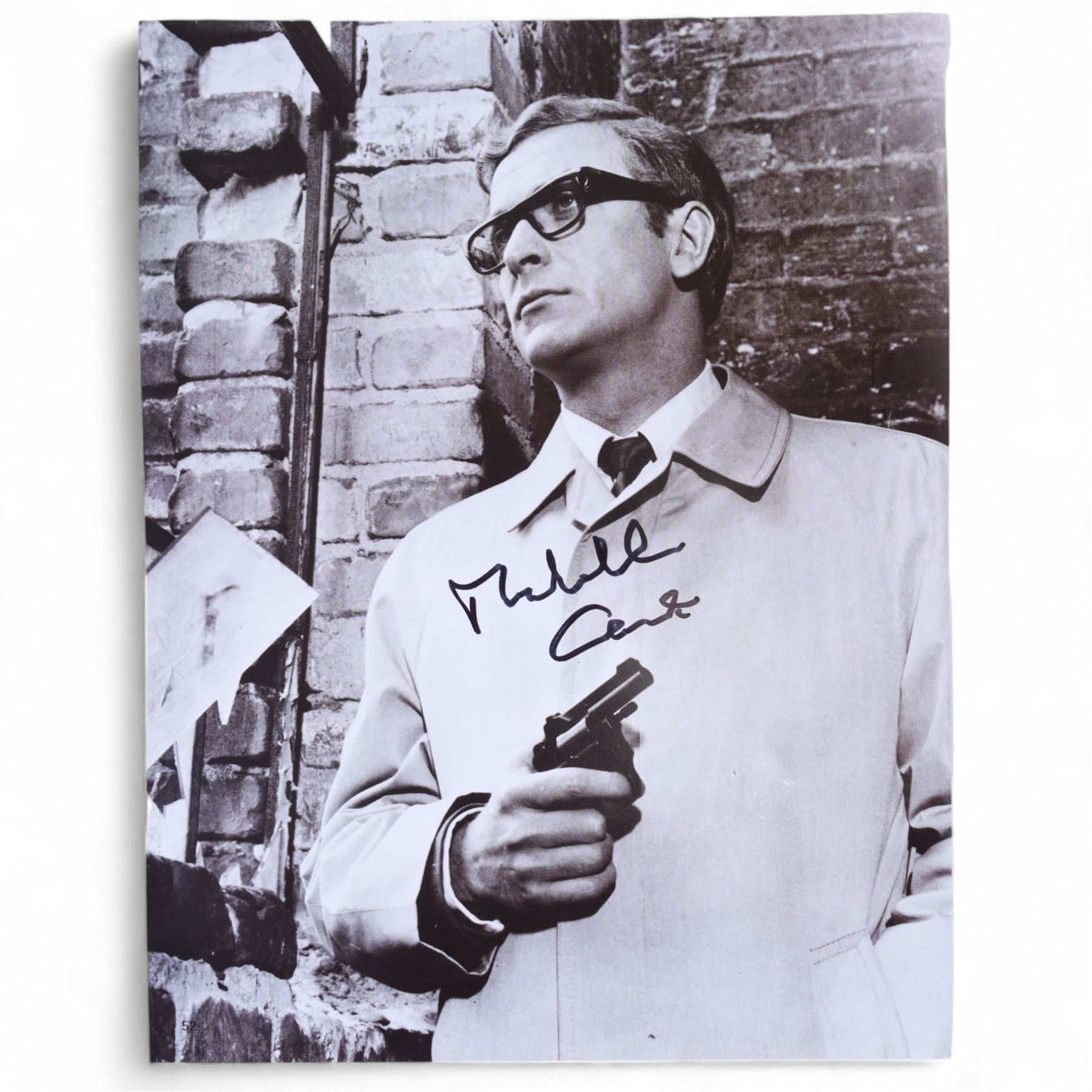 Michael Caine signed books and photographs, comprising 'The Elephant of Hollywood' autobiography and 'Blowing the Bloody Doors Off and Other Lessons in Life', black and white still from Funeral in Berlin and Sunday Times Magazine feature 'Caine on Caine'