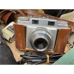 Collection of camera and equipment, to include Canon PowerShot S500, Cosmic 35, polaroid 320, etc, in two boxes  