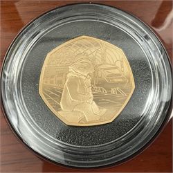 The Royal Mint United Kingdom 2018 'Paddington at the Station' gold proof fifty pence coin, cased with certificate