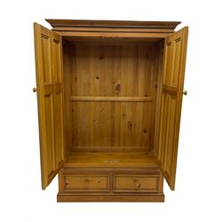 Solid pine double wardrobe, two drawers to base