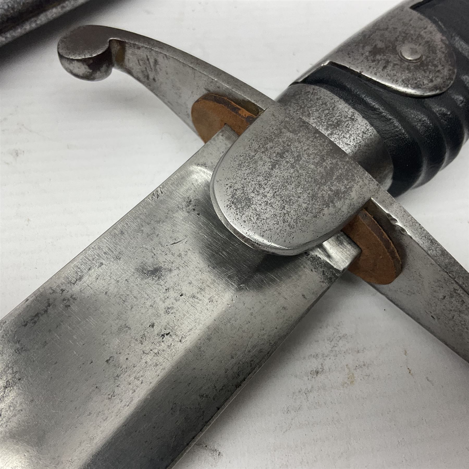 British 1796 Pattern Light Cavalry trooper's sword, the 84cm curving fullered blade stamped Hadley.1 to the back edge, steel hilt with knucklebow, D-shaped langets and leather grip; in polished steel scabbard stamped Osborn & Gunby Birmm. and W.R.16 ( ?16th Light Dragoons) with two suspension rings L100cm overall