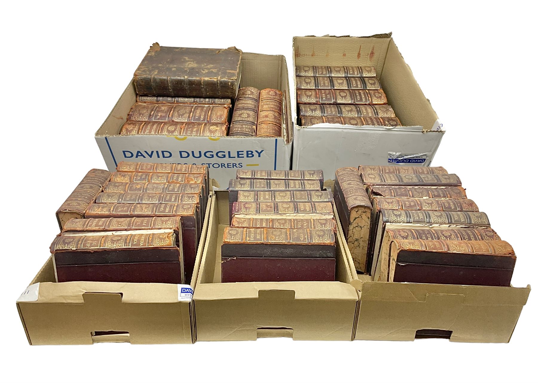 Thirty six volumes of Encyclopaedia Britannica with gold tooled red leather spines in various editions 