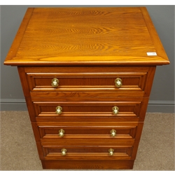  Four drawer oak finish chest, plinth base, W69cm, H90cm, D55cm  