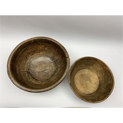 Late 18th century hewn elm dairy bowl, D35cm, together with a smaller 19th century fruitwood example, D28cm