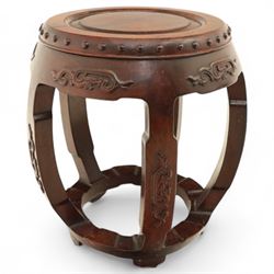 Pair of early 20th century Oriental hardwood barrel seats, of drum form with shaped apron and pierced panels, carved with stylised scrollwork and studded detail to the top