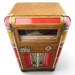 Rudolf Wurlitzer Company - Model 616 'Simplex' 1937 jukebox, figured walnut veneered cabinet with illuminated red and amber side panels enclosed by chromed uprights, glazed upper record compartment, cast Art Deco speaker grille, coin-operated push-button selection panel with circular title index, raised on a moulded base