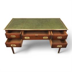 Military campaign style mahogany writing desk, inset gilt-tooled green leather writing surface, fitted with five drawers with recessed brass handles, brass corner mounts and protective bindings, on square tapering legs