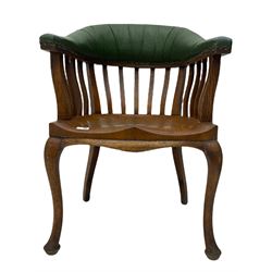 Early 20th century light oak desk chair, tub shaped upholstered back, saddle seat