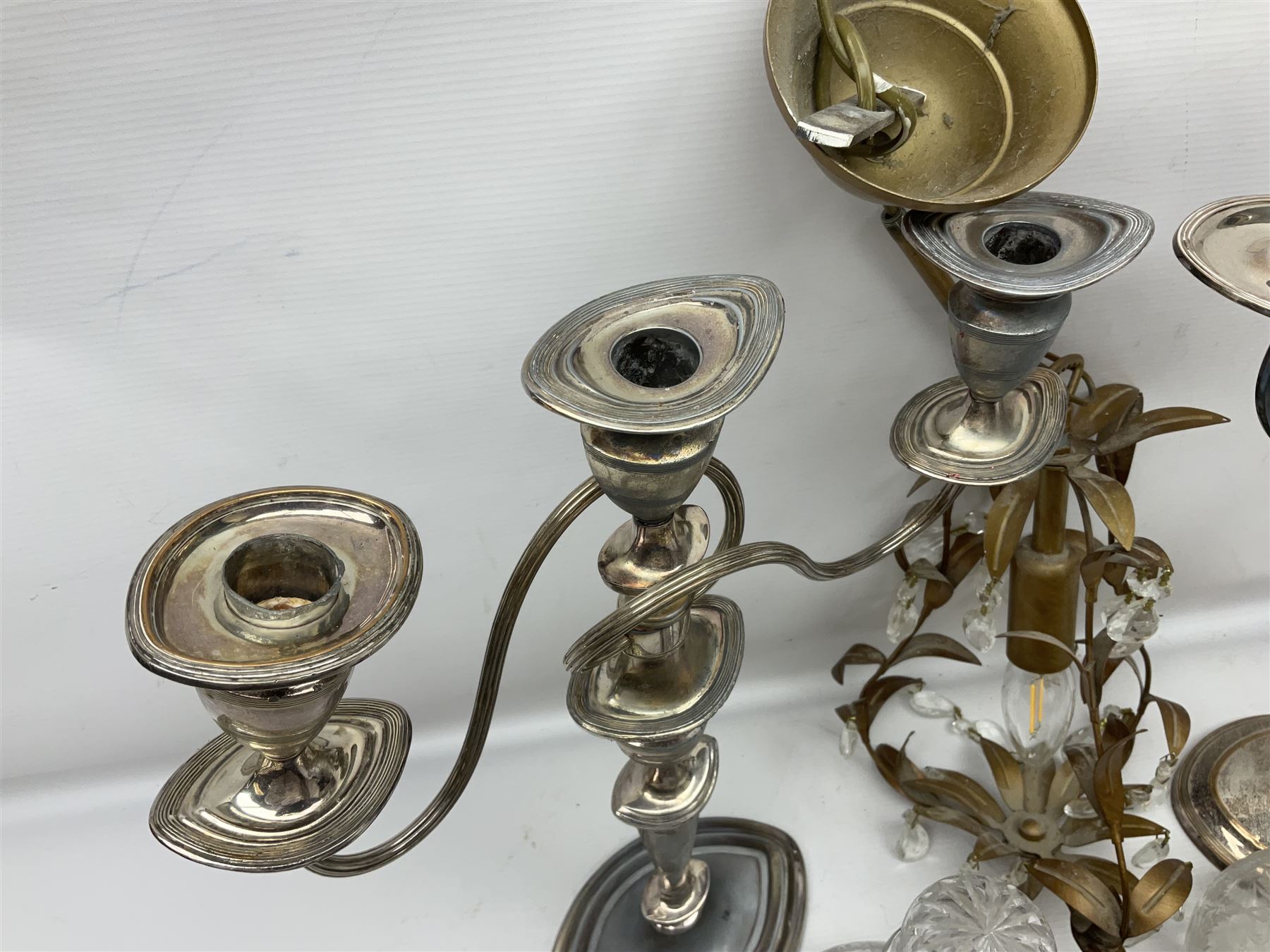 Two silver plate candelabras, together with two glass decanters, necklace and other collectables 