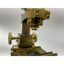 Mid 19th century brass monocular microscope by Andrew Ross, London No.180, with pitchfork base, rack and pinion focusing, revolving bed and swivelling barrel, with accessories, housed in a mahogany case with recessed carry handle and lockable doors